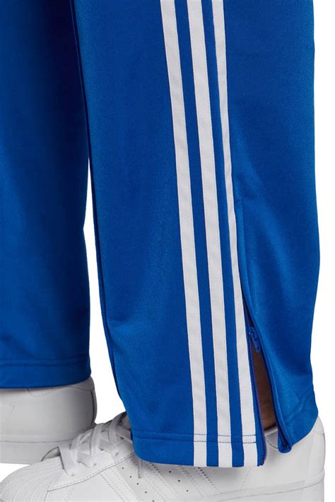 adidas trainingsbroek blauw oranje|adidas trainers broek.